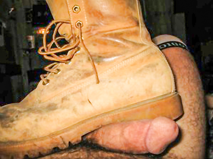 Cock crush with Timberland work boots.