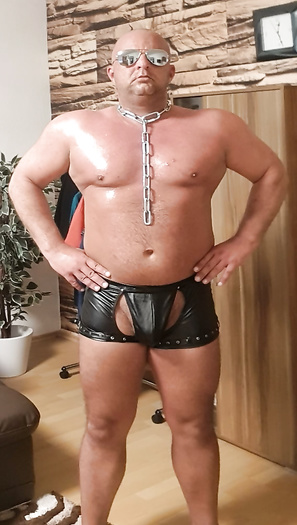 Posing in Leather shorts and chain