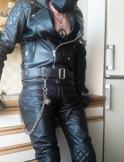 horny in padded pants and padded leather jacket