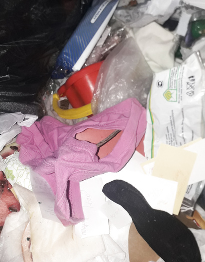 Thongs and socks ended up in the trash