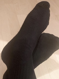 My feet in black socks