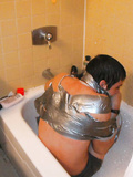 duct taped guy in bathtub