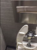 Guys pissing next to toilet
