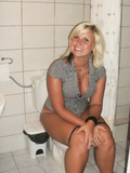 Blonde females sitting on toilets