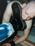 Skinhead slave licking boots and eating cum
