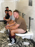 Guys on toilet with buddies