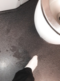 Shoeless in a dirty Toilet