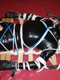Restrained rubberslave.