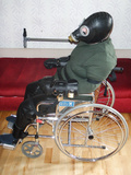 Slave in a wheelchair