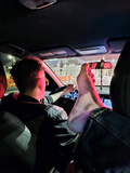Putting feet up by Uber driver