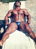 Big Muscular Asian Man Sunning & Relaxling