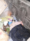 Girl's clothes and guy's briefs in the trash