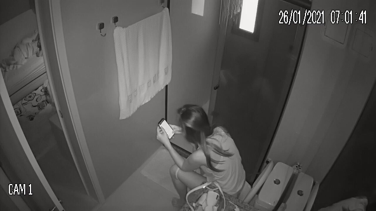 Girl pooping and using cell phone