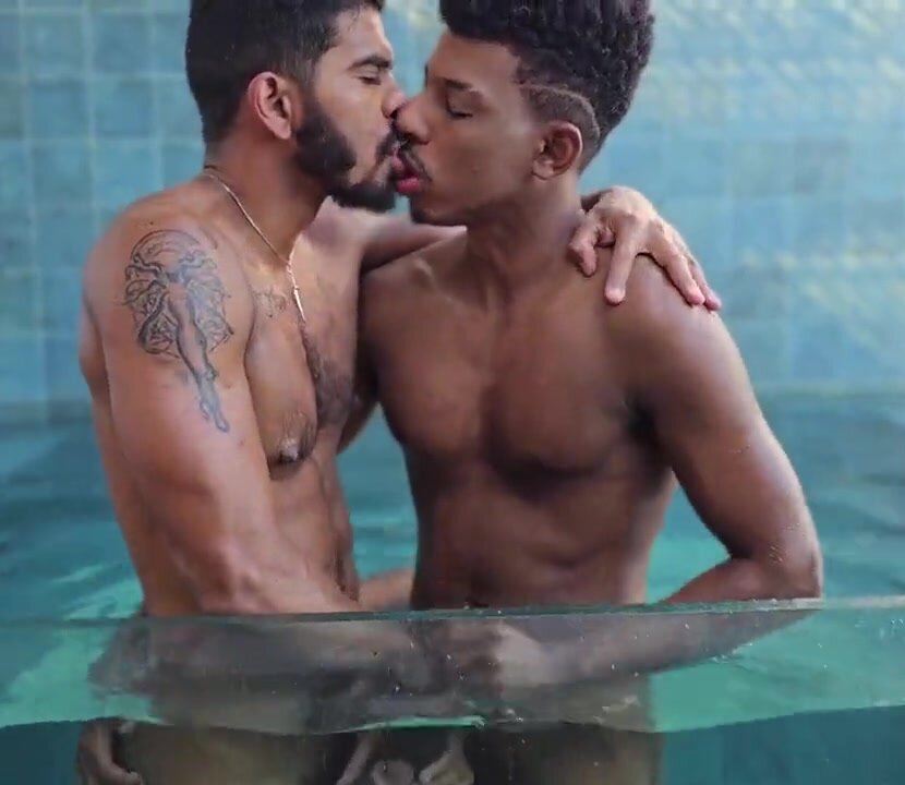 Black and Latino guys kiss and fondle their hard cocks