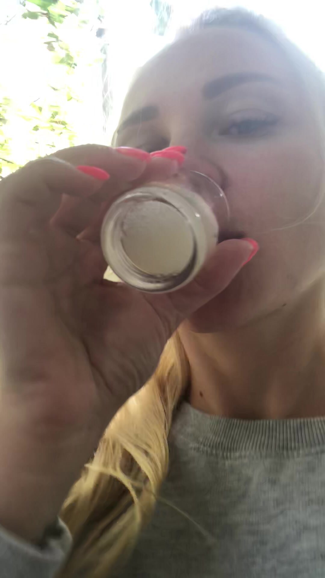 she drinks a glass of cum in the street and talk