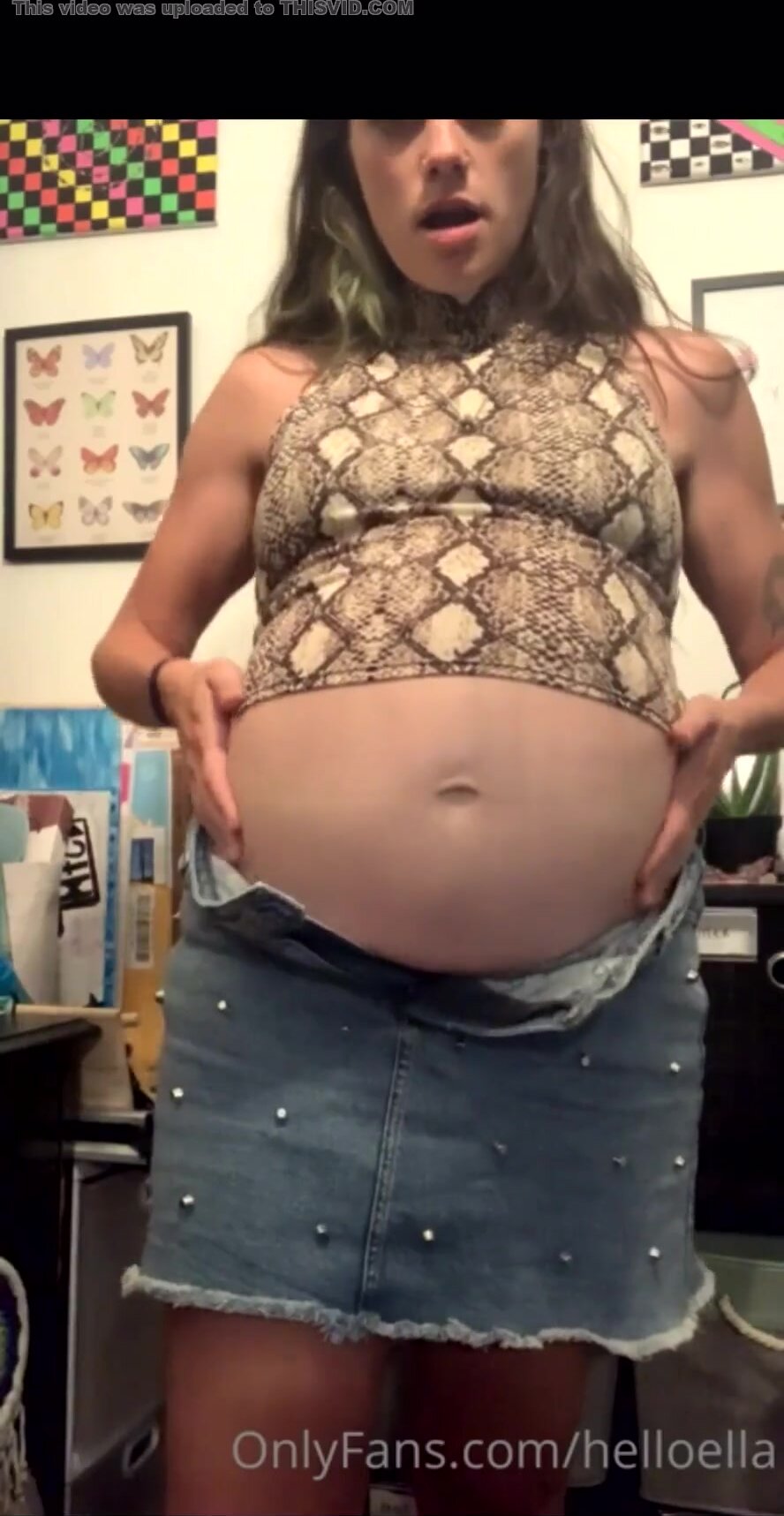 Girl showing huge belly