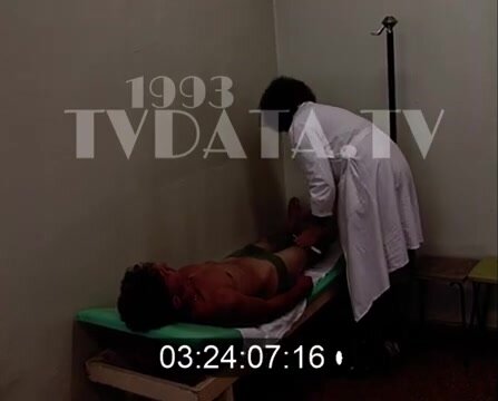Old footage of army medical - very few nudity