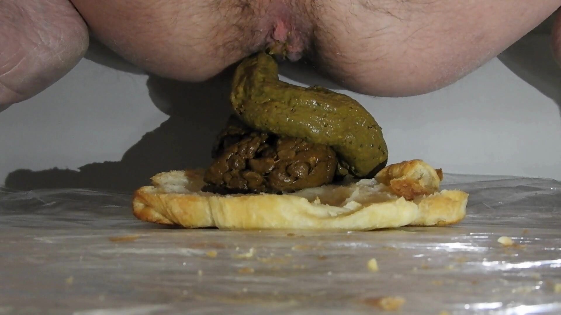Filling a croissant with a lot of fresh poop & cum