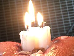 Candles burning in ass