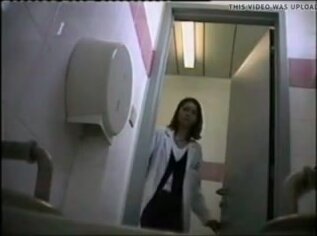 Doctor changes pad in toilet
