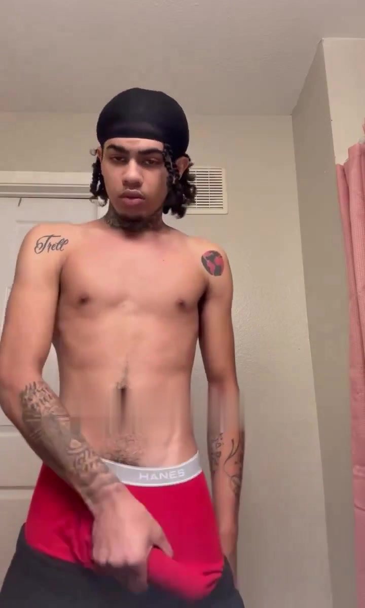 sexy young light-skinned stud showing off bulge