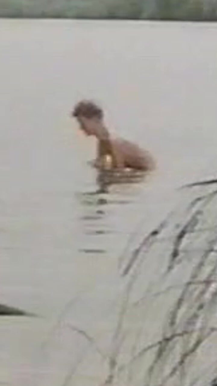 Pants off in the lake (boy skinny dip)