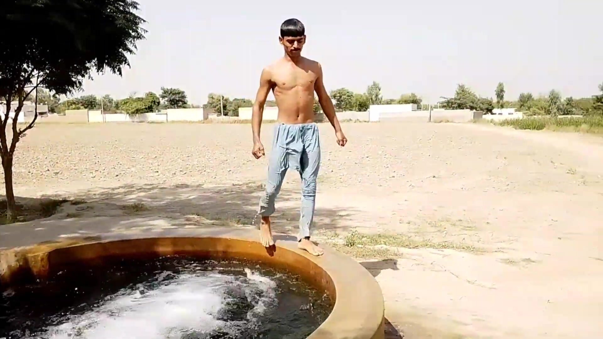 Cocky Guy Loves Showing Bulge At The Tubewell