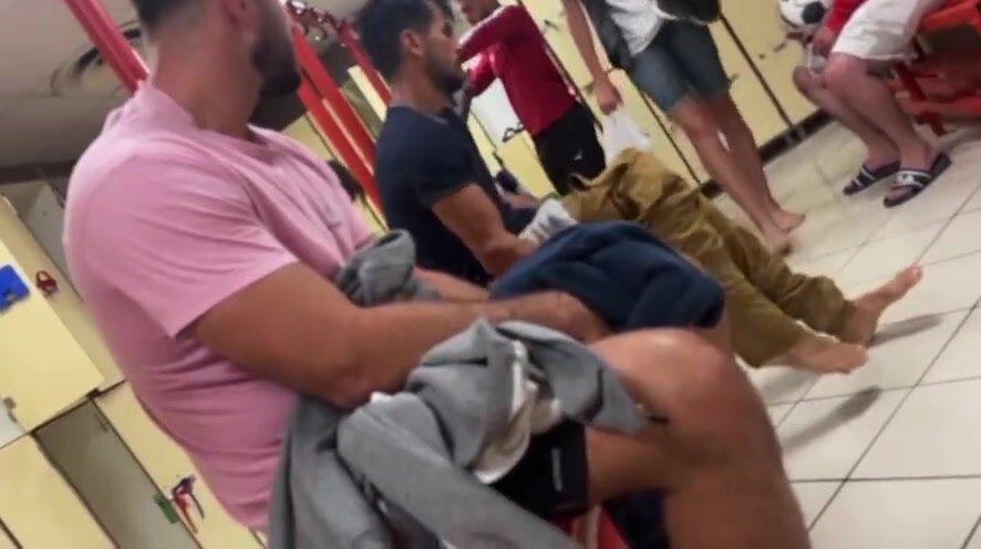 Cocky guy shows off his massive uncut dick at the gym