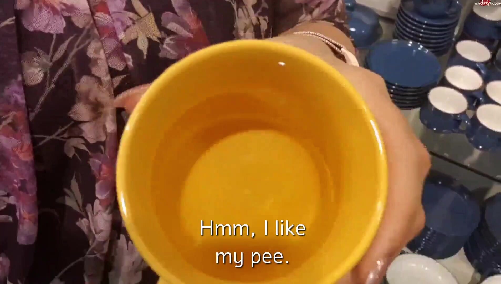 *Subtitled* German pissing in a mug and leaving it