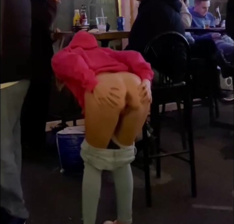 Drunk girl flashes at bar