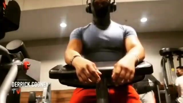 muscle beast pops his massive pecs at the gym