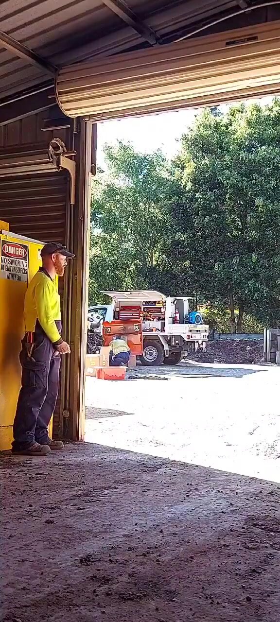 Horny ginger tradie jerking dick at company warehouse