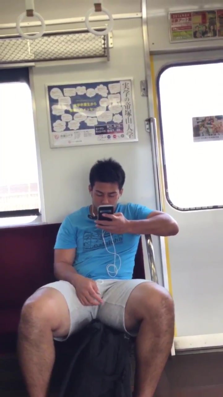 Handsome athletic guy gets an erection on the train