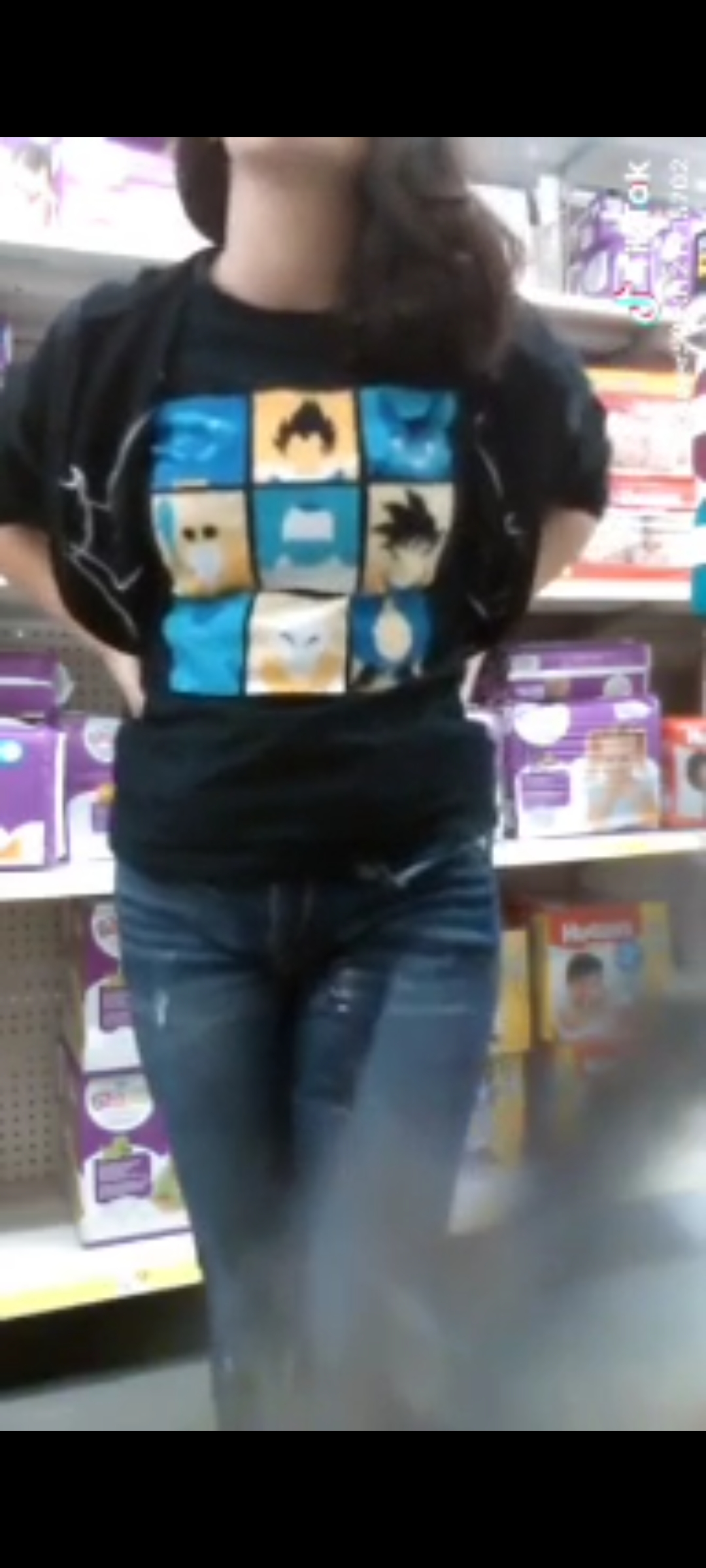 Girl pissing pants in supermarket