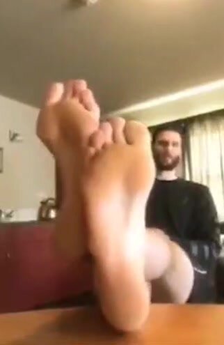 hot man showing his huge feet