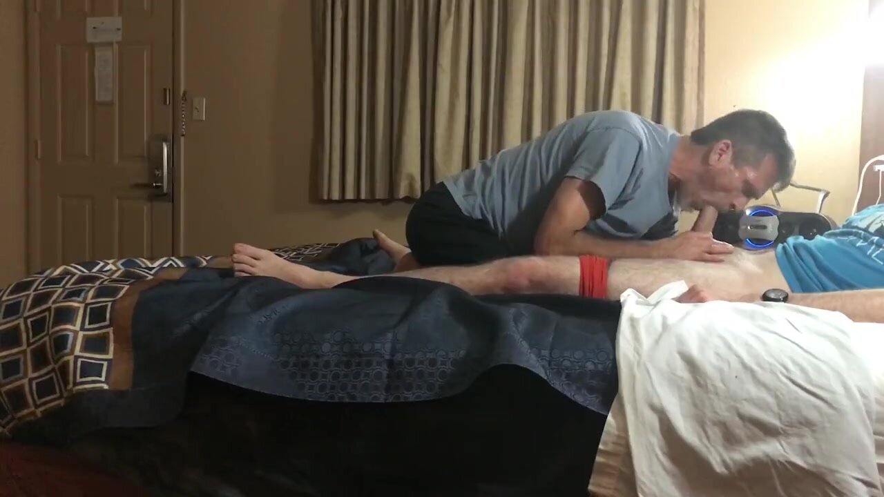 Nasty daddy sucking a nervous younger guy