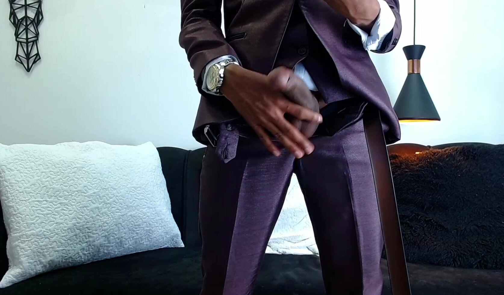 Sexy black man in suit flashes his dick on cam