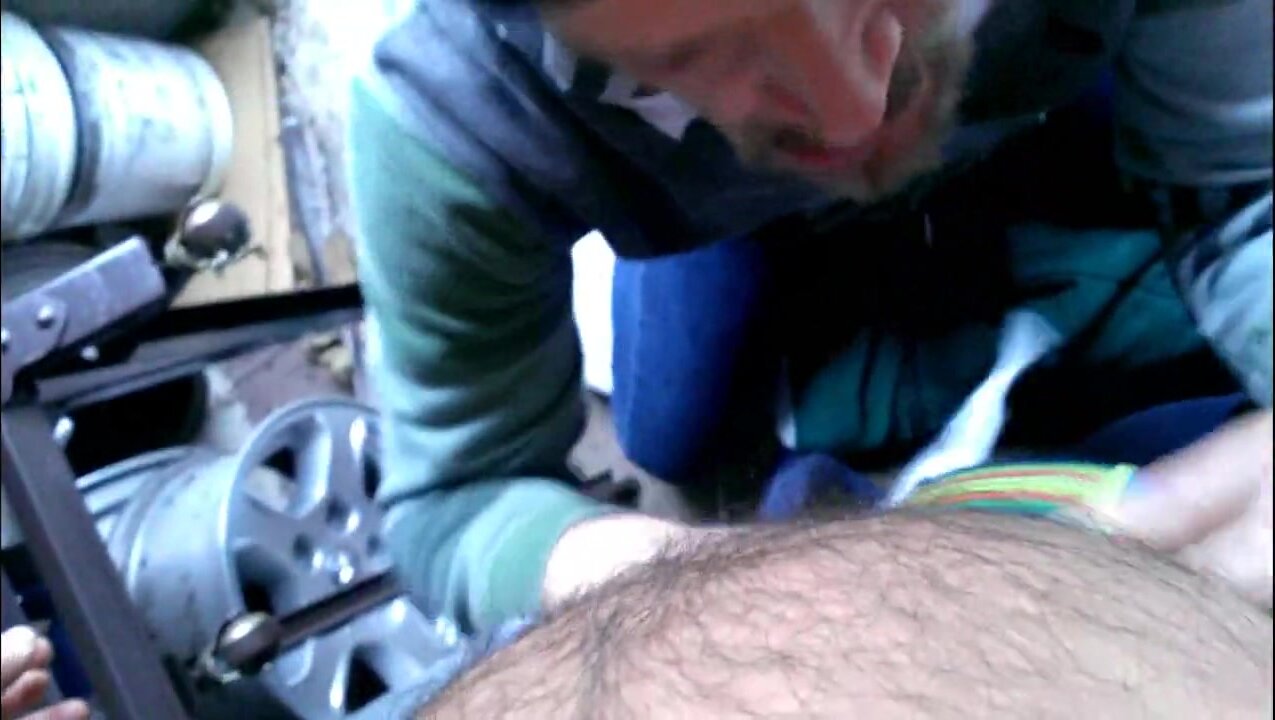 Sucking Off Buddy in Garage