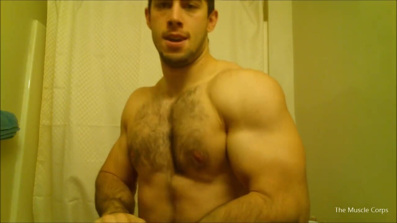 Alpha admiring his big biceps