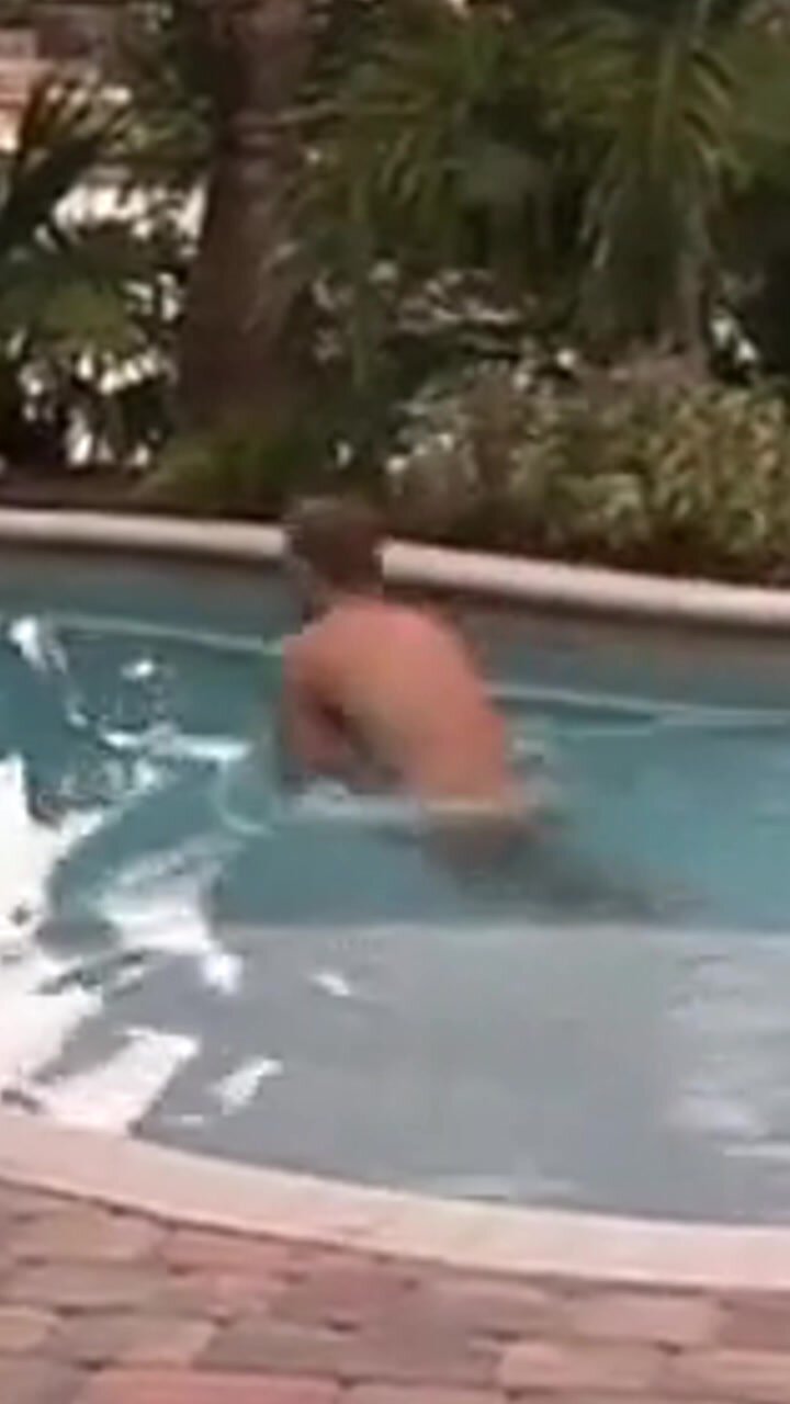 Nude dip in the pool