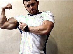 Fit guy flexing and ripping shirt