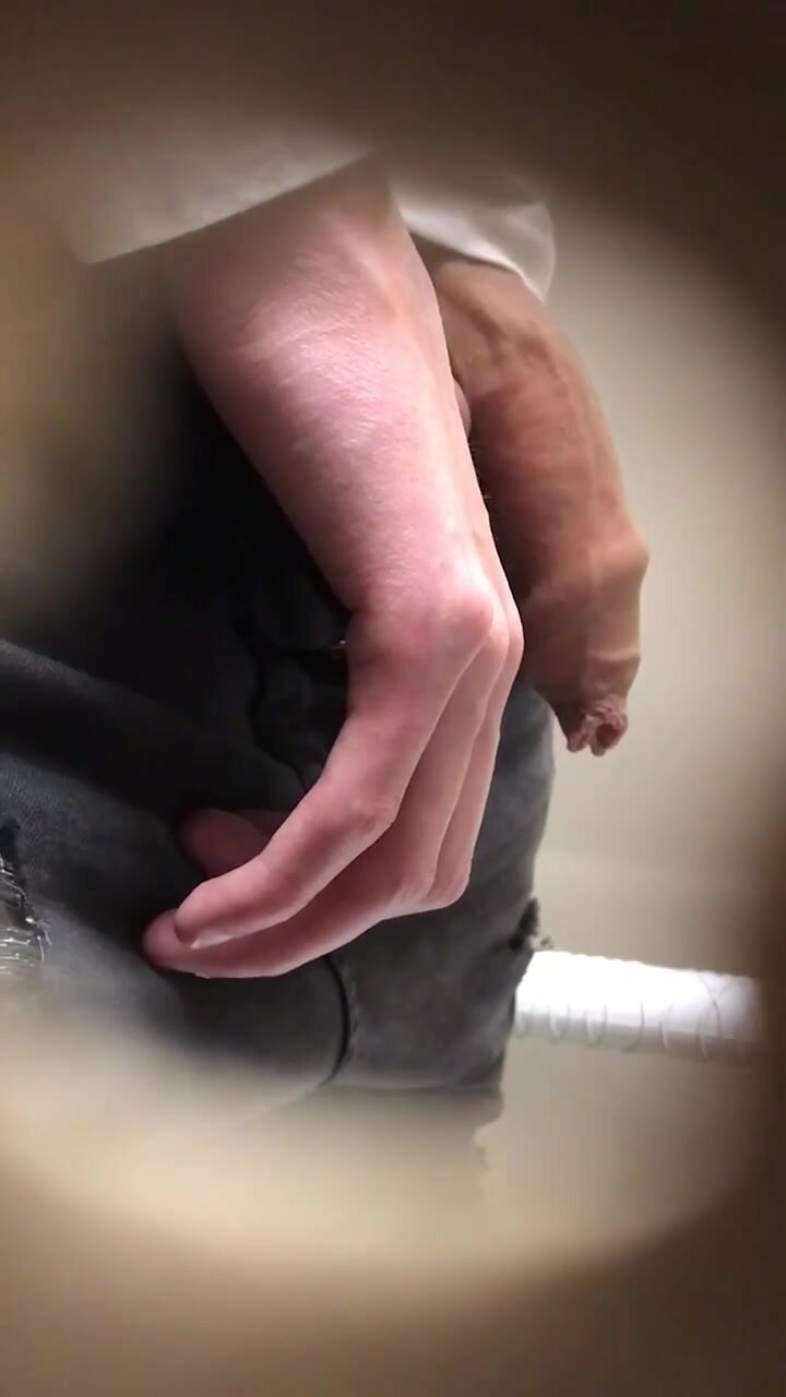 meaty uncircumcised foreskin at the urinal