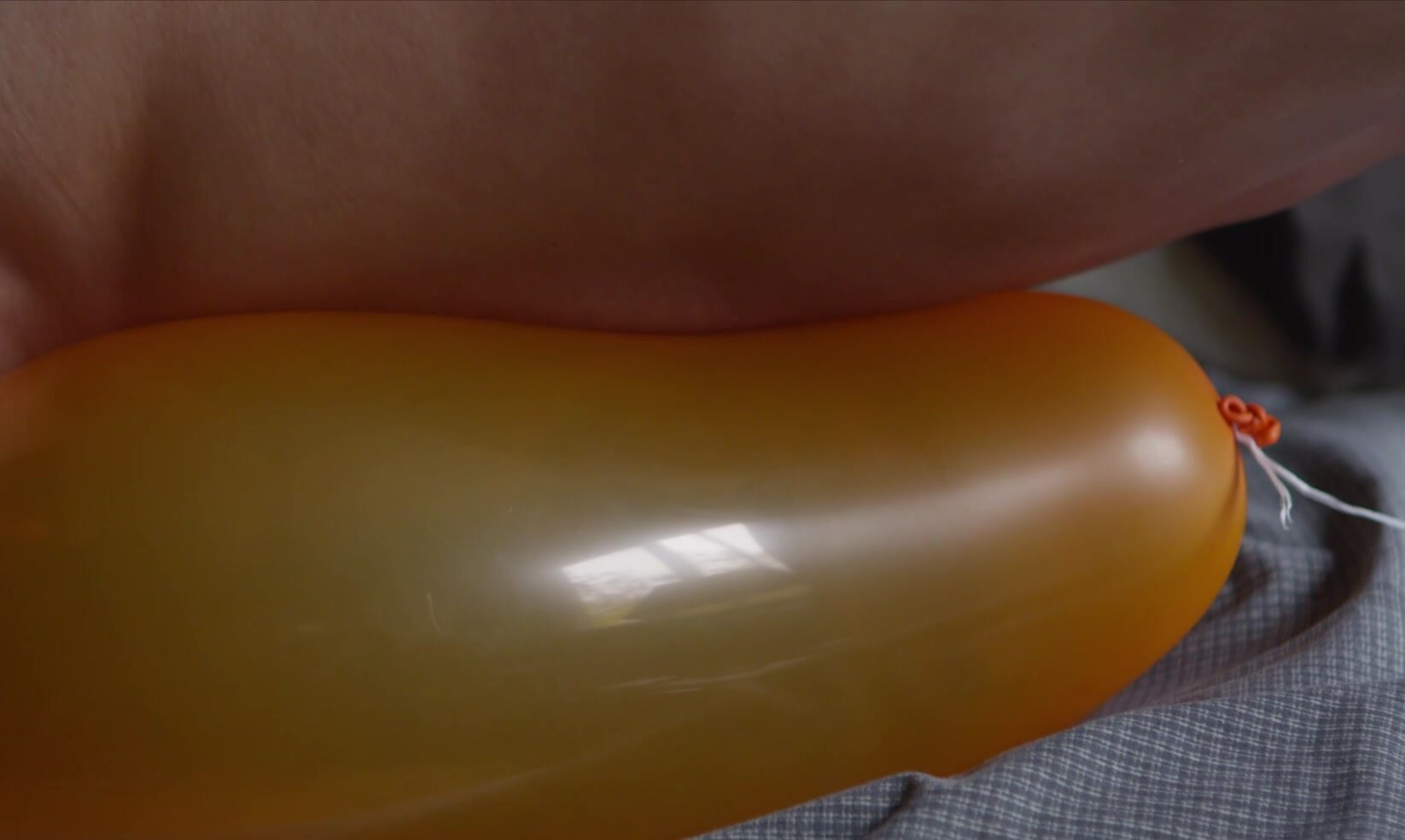 Hot Guy plays with balloon and cums