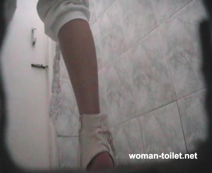 Lady shitting in public wc