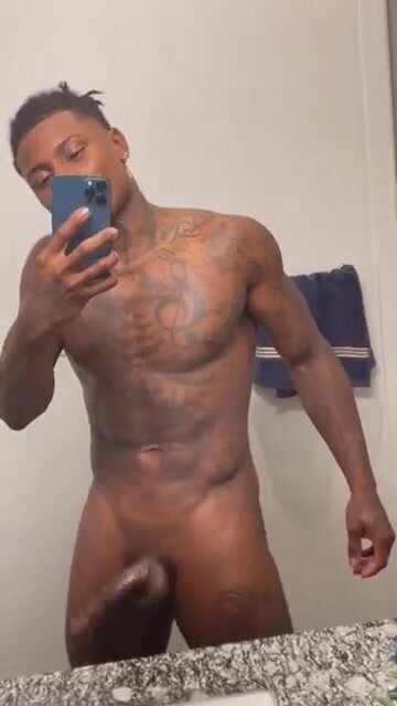 sexy black guy showing off body and cock