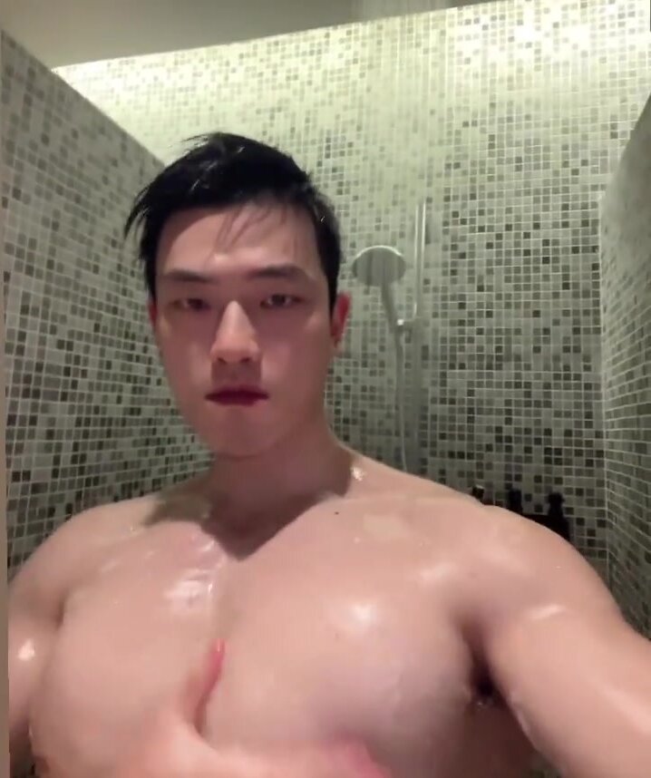 big breasted man in shower