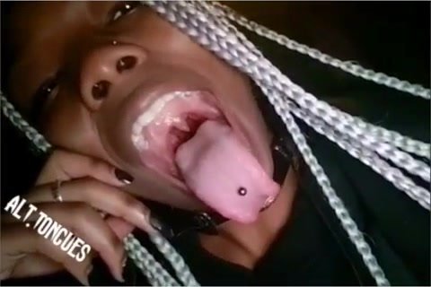 Black Emo Girl with Long Tongue
