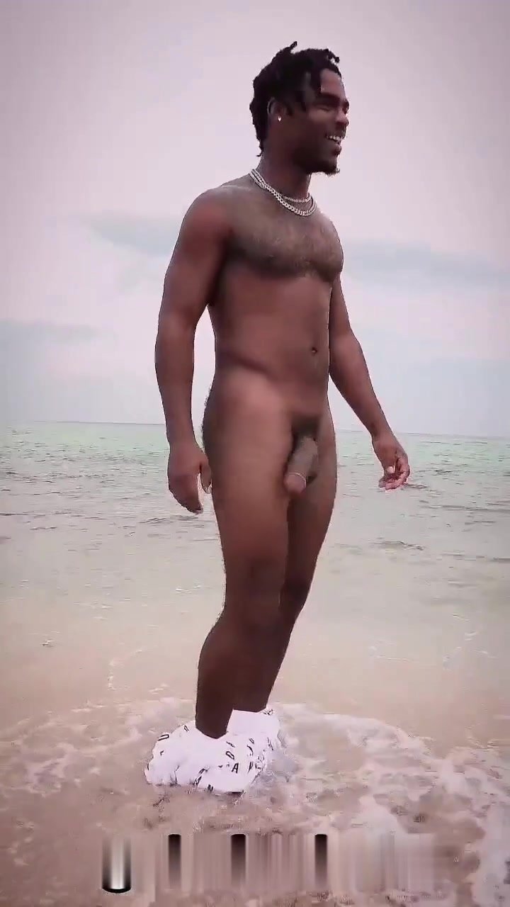sexy hung black stud naked on the beach