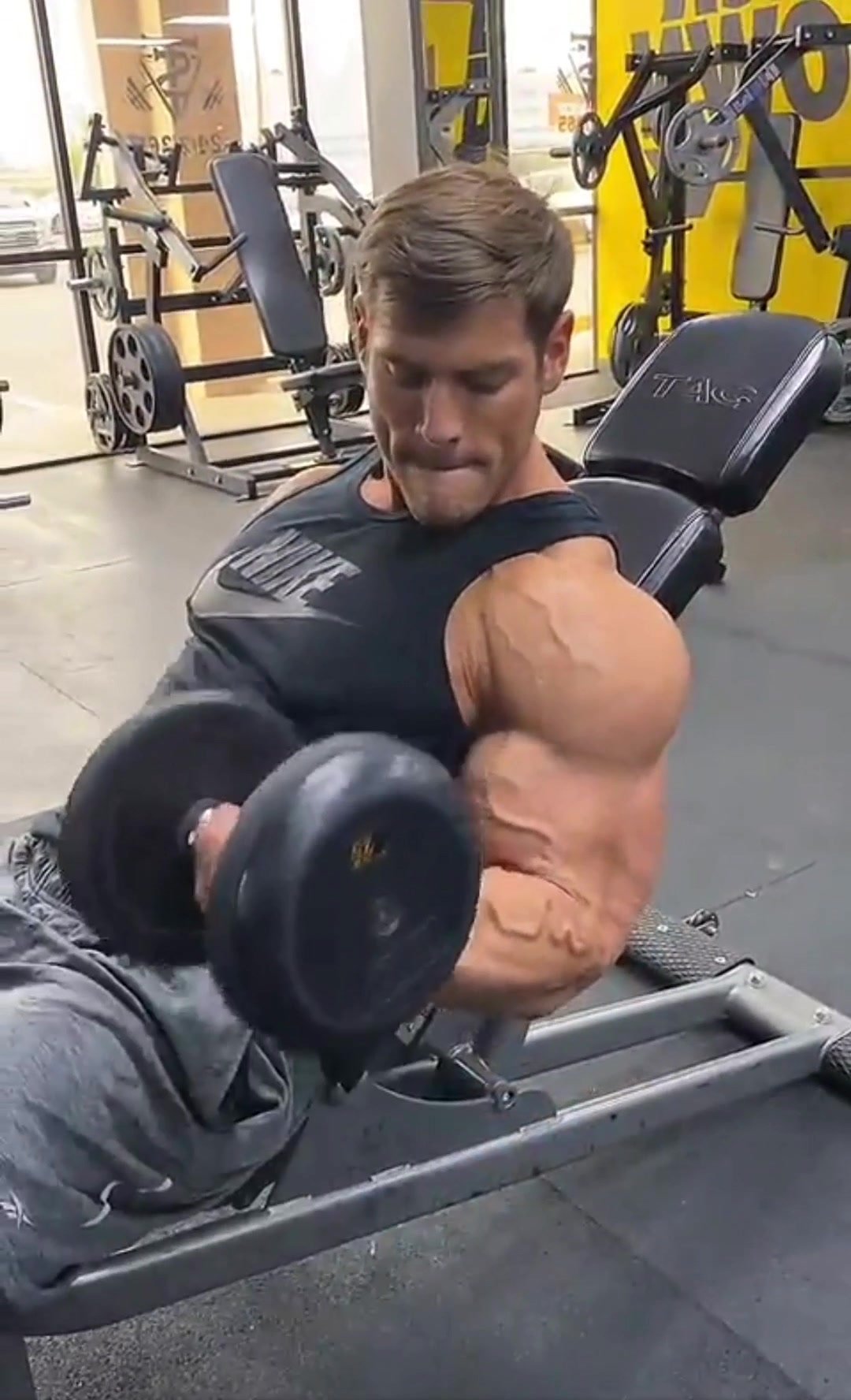 Bodybuilder working out biceps
