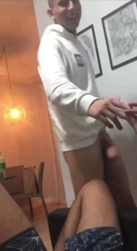 friend showing off huge cock to other friends